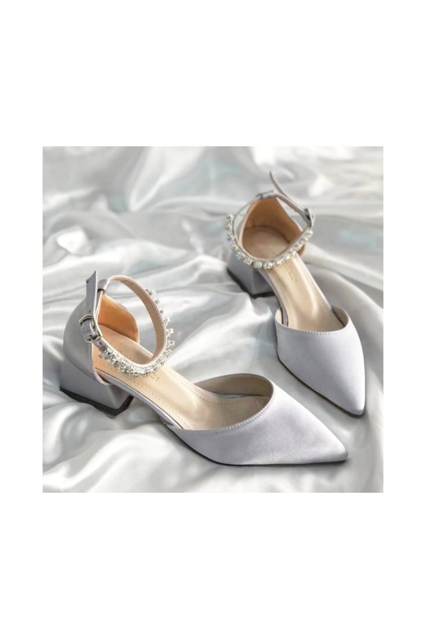 Satin material, ankle-high, bejeweled platform heel women's dress shoes.