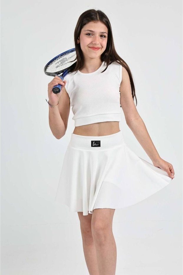 Girls' Cropped athletic skirt with embroidered shorts set , Corded Fabric fabric.