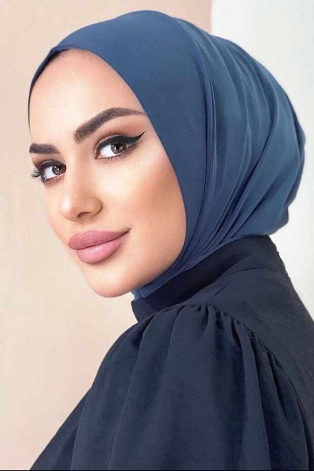 Hijab Swimmer Citcitli Bonnet Shawl (Sea and Pool Cap), Matching Indigo Color with the Hijab and Swimsuit Top.