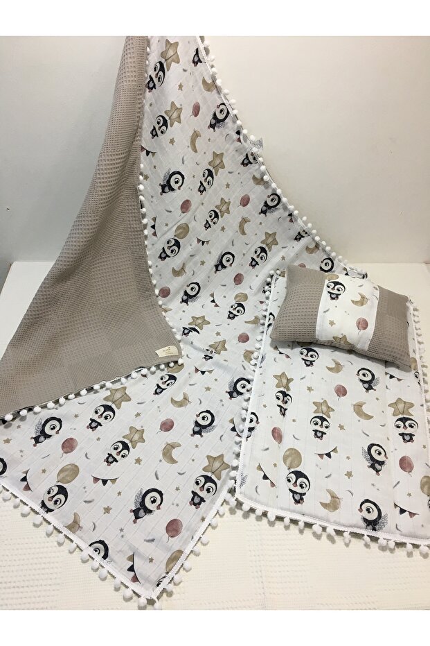 Brown, muslin changing mat with pom-poms, Pillow , and Blanket 3-piece set.