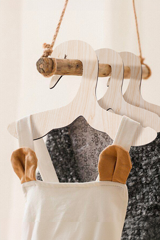 Swan-shaped wooden clothes hangers for babies and toddlers