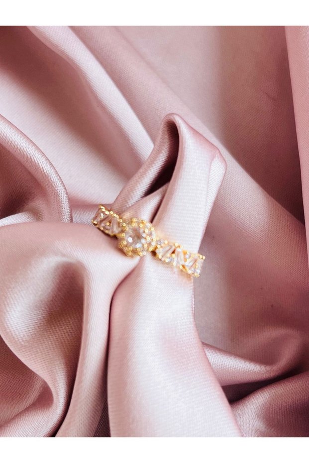 Gold-colored, single-stone embellished, full-circle adjustable ring.