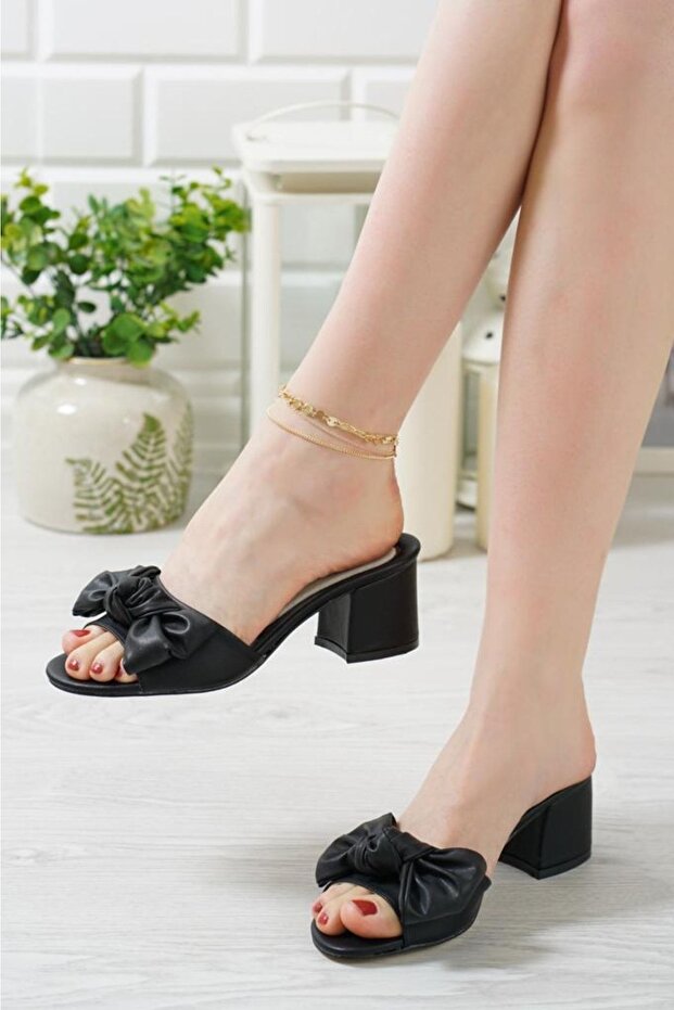 النعال القوس الأسود - 1