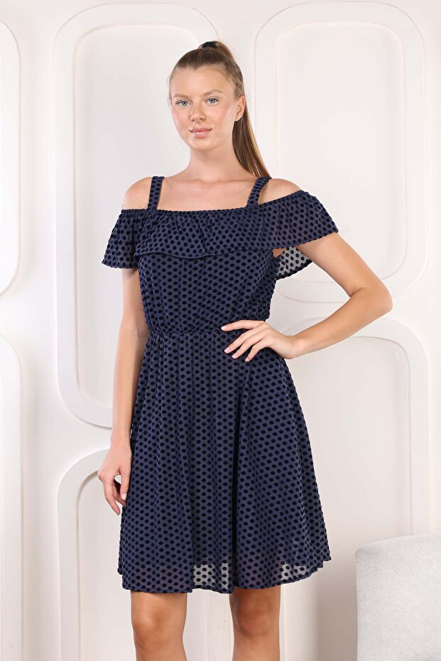 Navy blue women's dress with ruffled shoulder