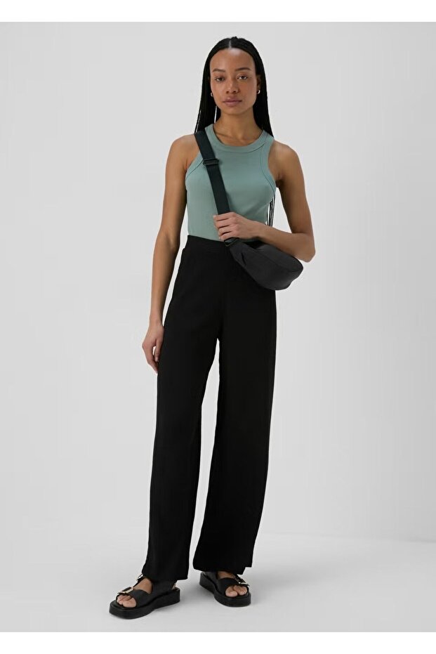 Black pleated women's trousers