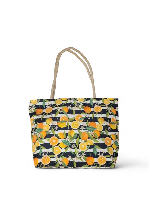 حقيبة كتف منقوشة باللون البرتقالي والليمون على الشاطئ - 1