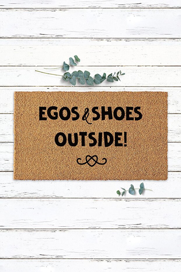 Egos and shoes outside koko door front mat