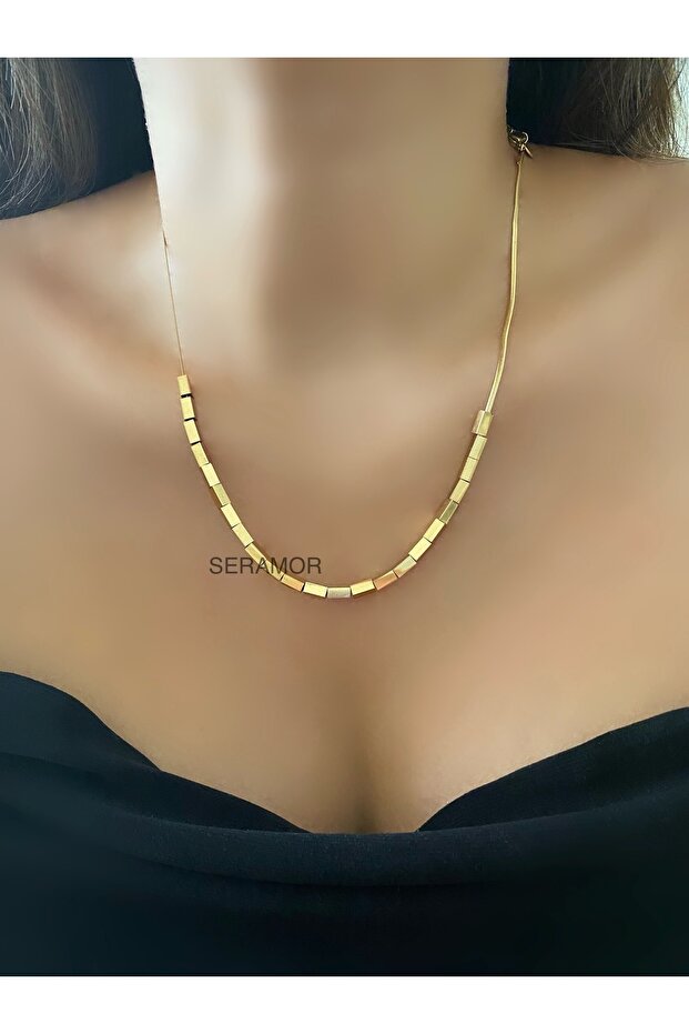 Non-tarnishing stainless steel thin Italian chain necklace with a tiered design.