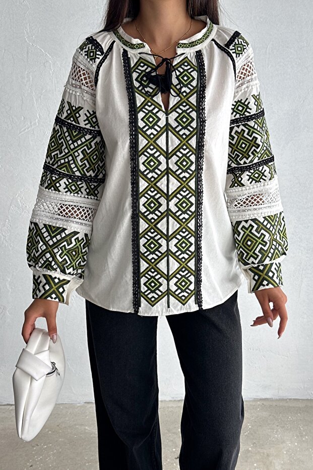 White tassel detailed fully embroidered cotton blouse