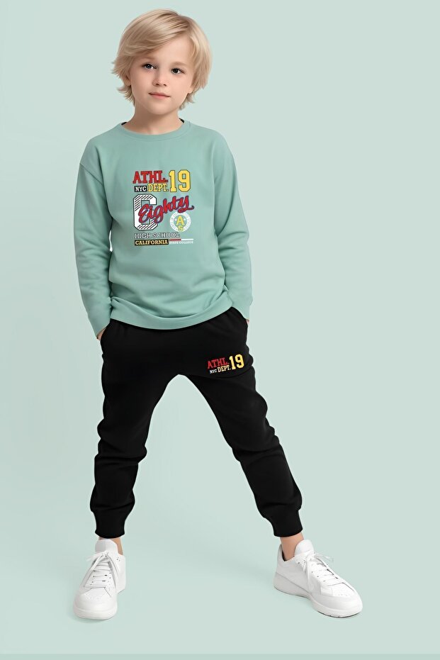 طقم علوي وسفلي للأولاد مع جيوب مطبوعة