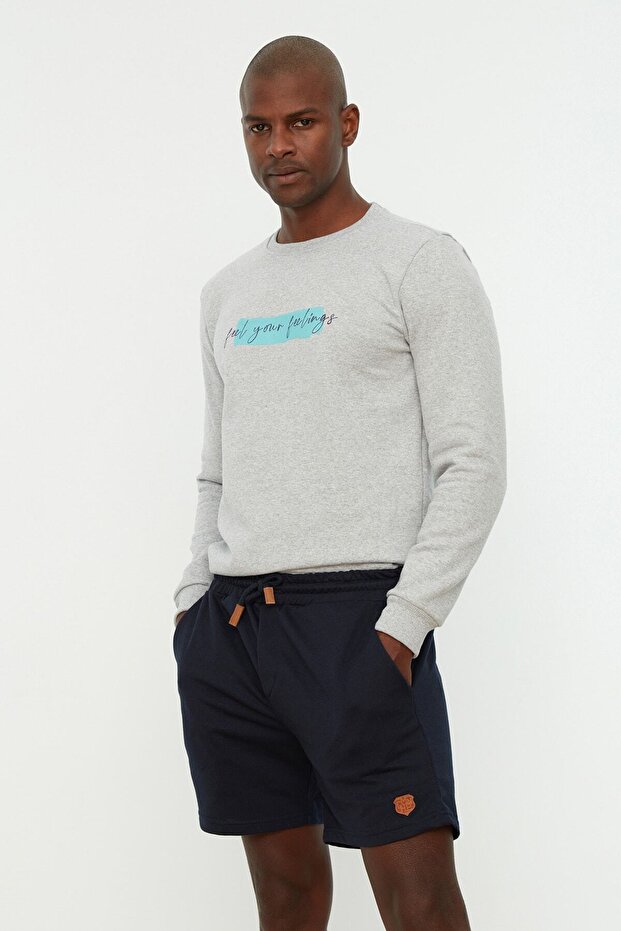 Marineblaue, normal geschnittene, kurze Shorts mit PU-Etikett und elastischer Taille und Schnürung TMNSS22SR0403 - 12