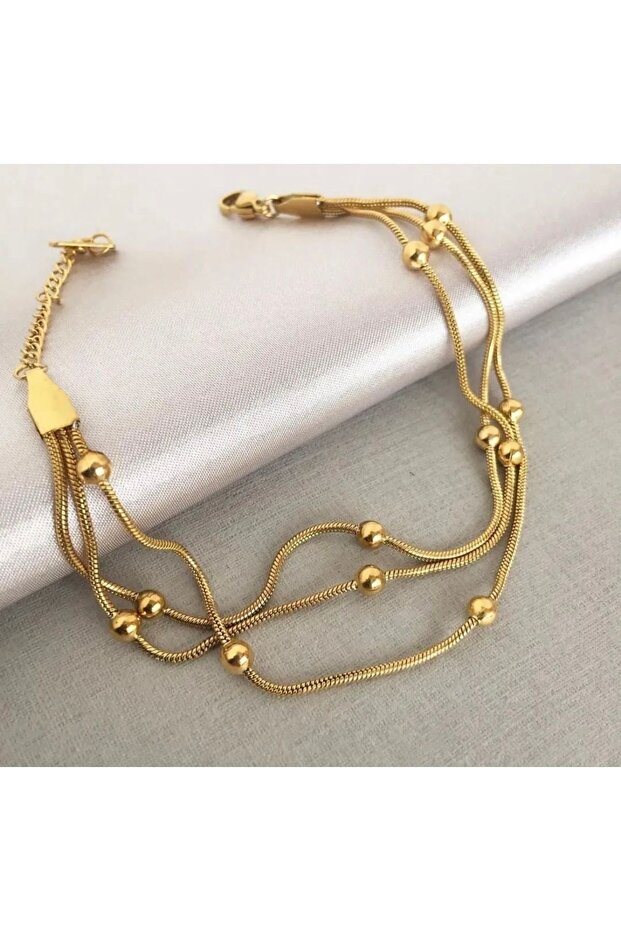 Three chain dorica gold steel bracelet