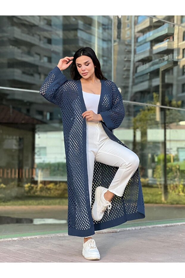 سترة نسائية طويلة محبوكة بفتحة