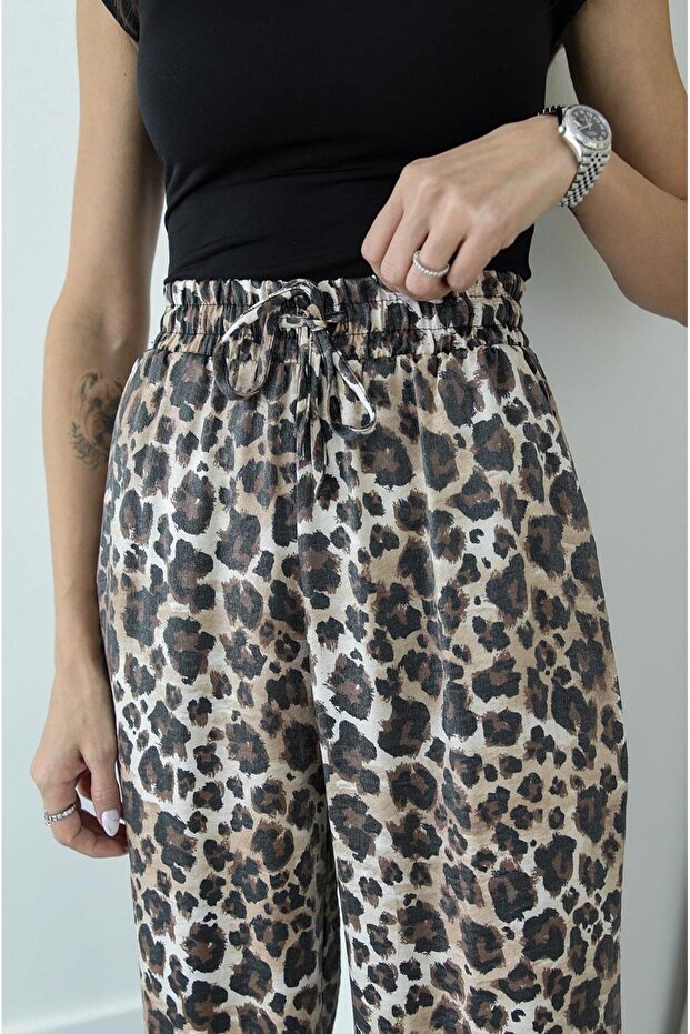 بنطلون بيج منقوش بنقشة الفهد - 4