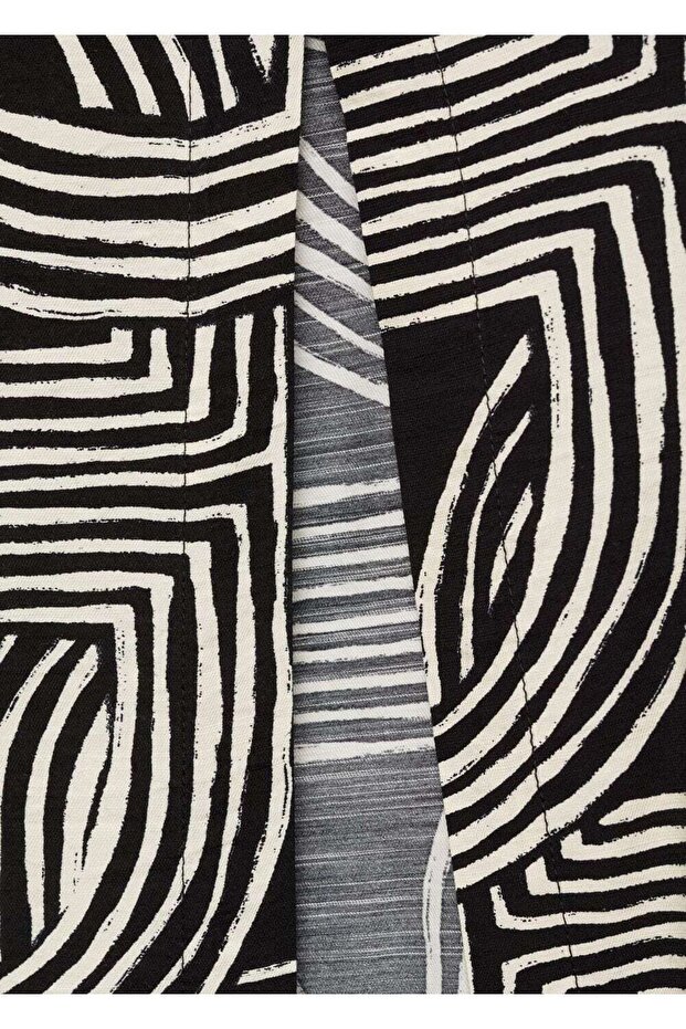 Desenli yırtmaçlı etek - 7