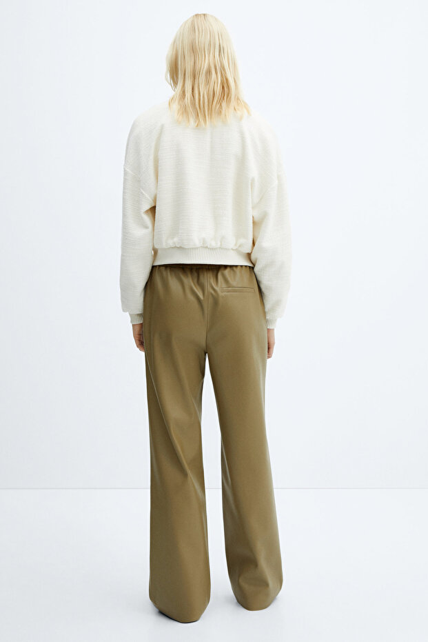 Leather-effect elastic waist trousers - 8