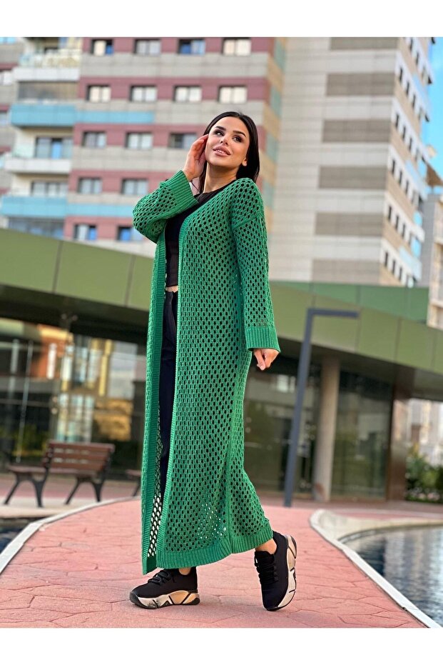 سترة نسائية طويلة محبوكة بفتحة