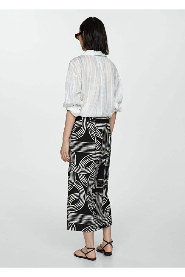 Desenli yırtmaçlı etek - 4