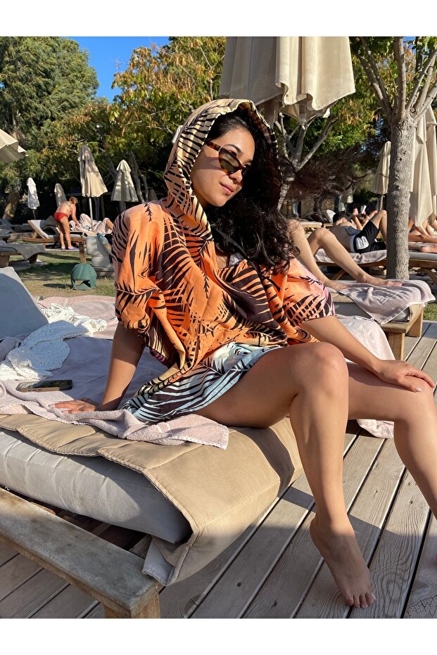 منشفة الشاطئ المعطف