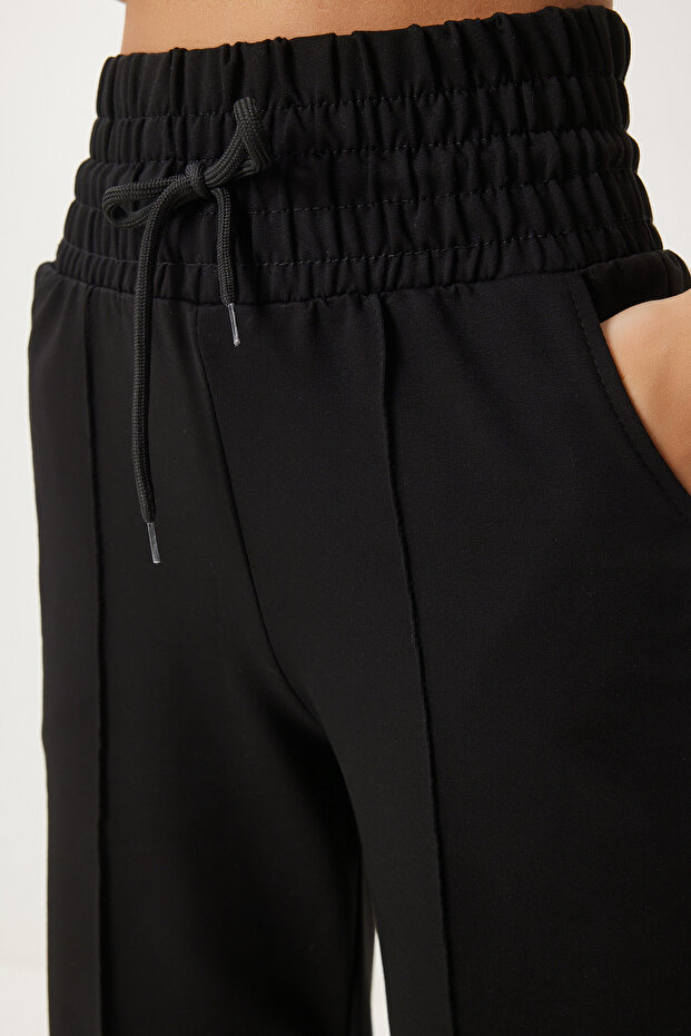 Damskie spodnie dresowe Basic z czarną kieszenią XR00018 - 5