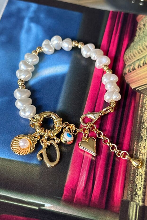 Ü Letter Pearl Model Oyster, Evil Eye and Heart Dangle Design Bracelet