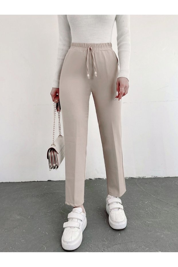 Hose mit elastischem Bund, Doppeltaschen und Spitzendetail
