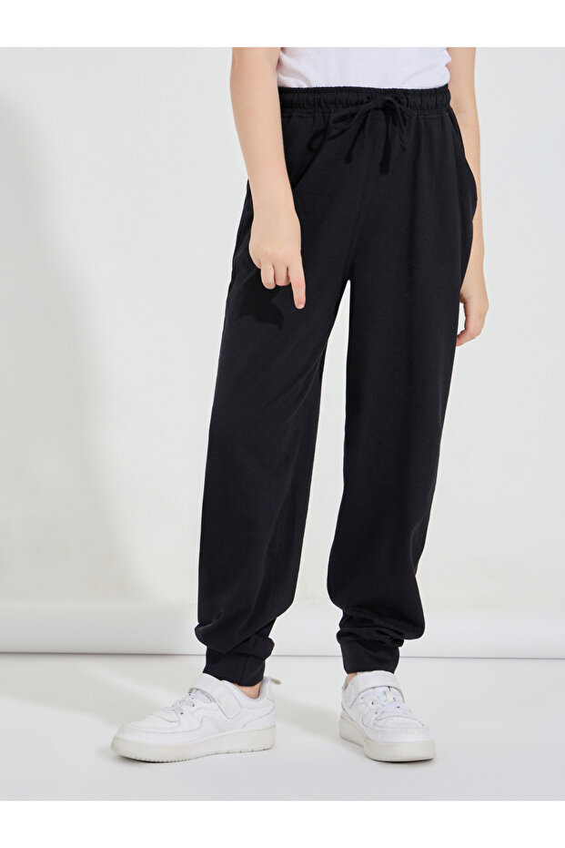 بنطال رياضي ضيق بأساور مدببة مع أربطة - 1