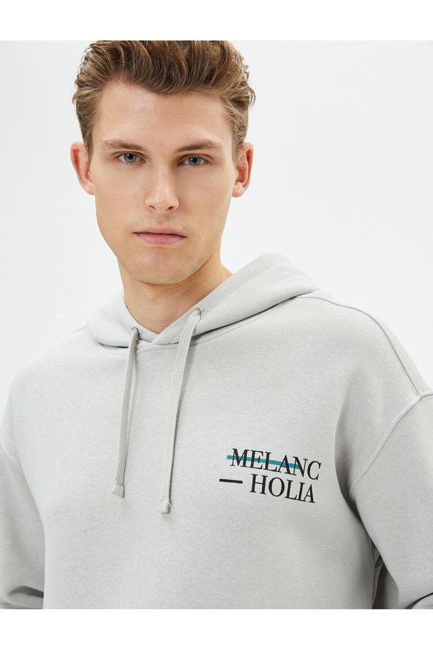 Oversize Hoodie with Printed Kangaroo Pocket Detail and Slogan on the Back