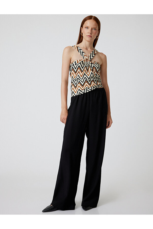 Geometric Patterned Asymmetric Halter Neck Top with Ring Detail