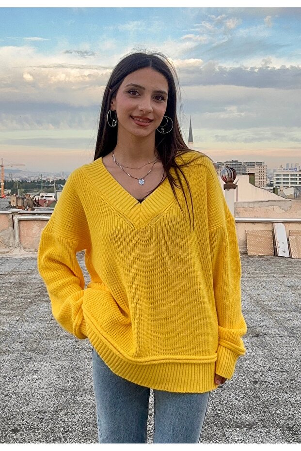 Oversized V-Neck Sweater with Sleeve and Hem Details
