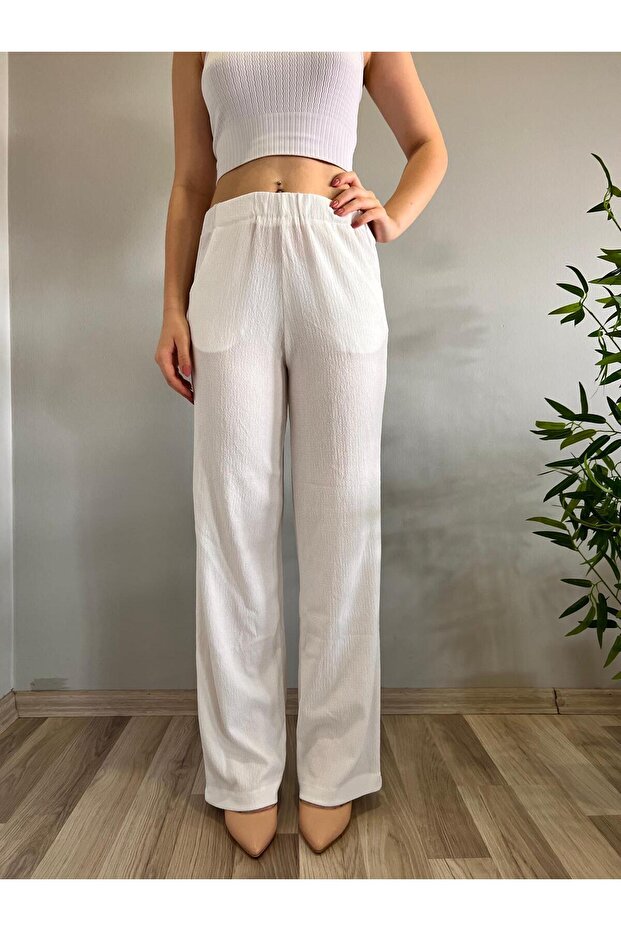 Women's wide leg pleated fabric trousers