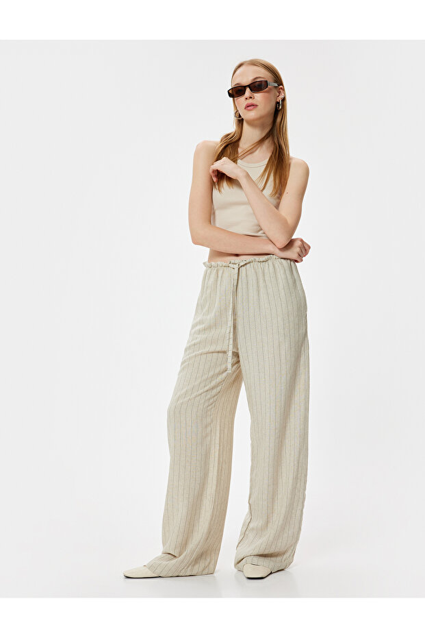 Oversize Trousers with Lace-Up Waist, Ruffle Detail and Pockets