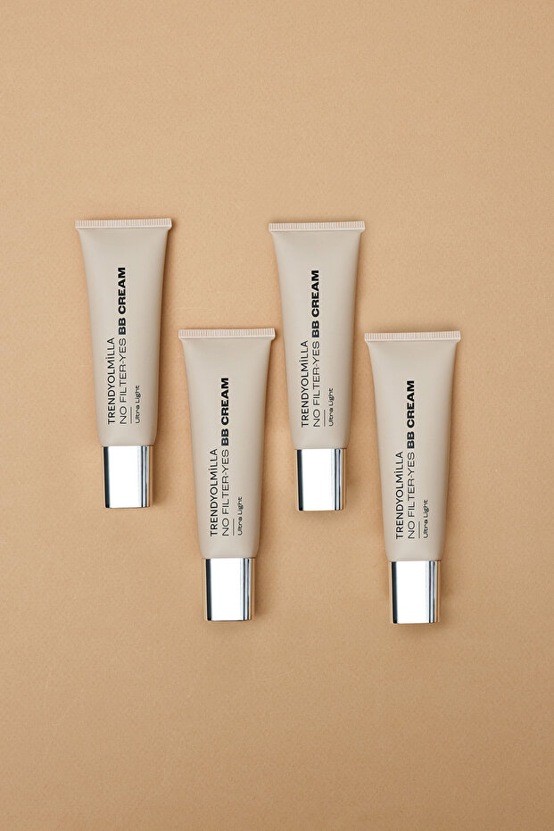 Doğal ve Parlak Bitişli Ultra Hafif BB Krem SPF 15 Medium to Dark-104 TKZAW25LJ00000 - 10