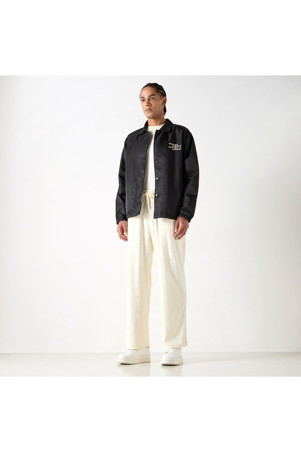 All-Over Monogram Detail Track Pants with Drawstring Closure and Pockets - 2