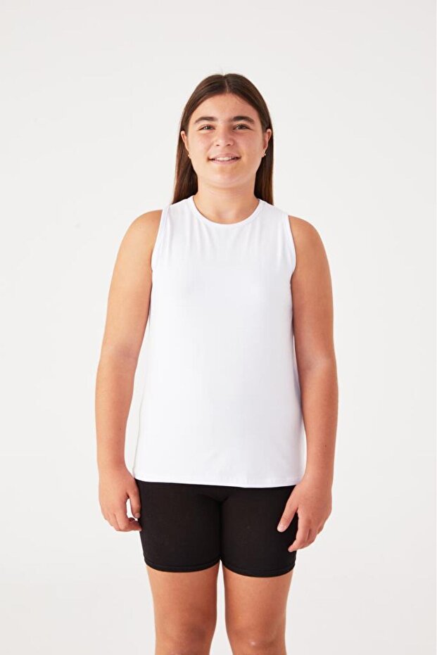 تي شيرت بناتي بدون أكمام من القطن برقبة دائرية 2009 - 2