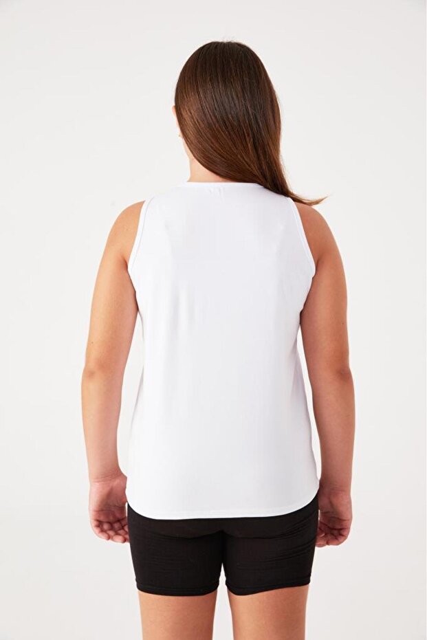 تي شيرت بناتي بدون أكمام من القطن برقبة دائرية 2009 - 4