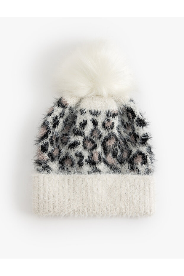 Knitted Beanie with Pom Pom Detail, Leopard Pattern, Soft Textured, Folded