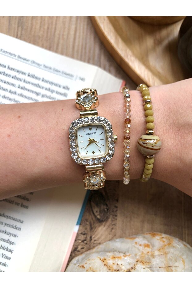 Elegant Gold Women's Wristwatch with Square Stones