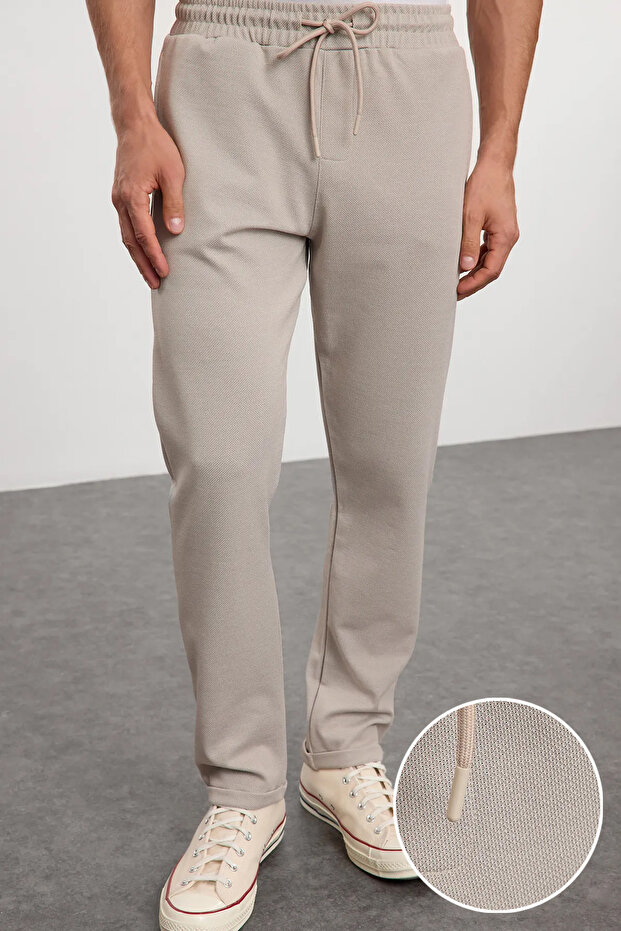 Bej Regular Fit Örme Esnek Rahat Beli Bağlamalı Lastikli Duble Paça Kumaş Pantolon TMNAW25PL00002 - 1