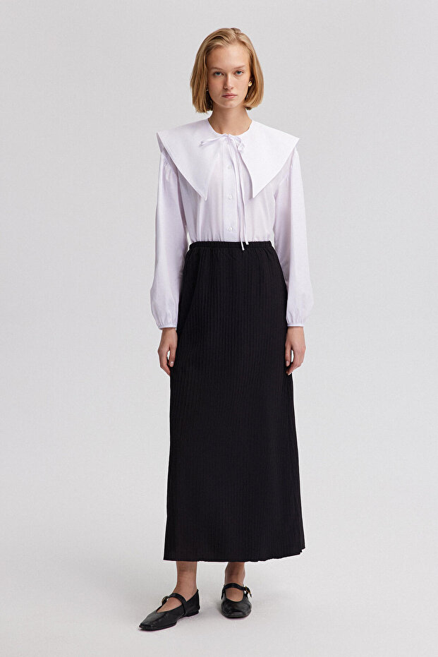 BASIC-ROCK MIT ELASTISCHEM BAND BELI - 1