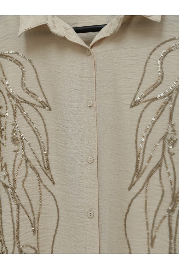 قميص مزين بالترتر على شكل ورقة شجر - 1
