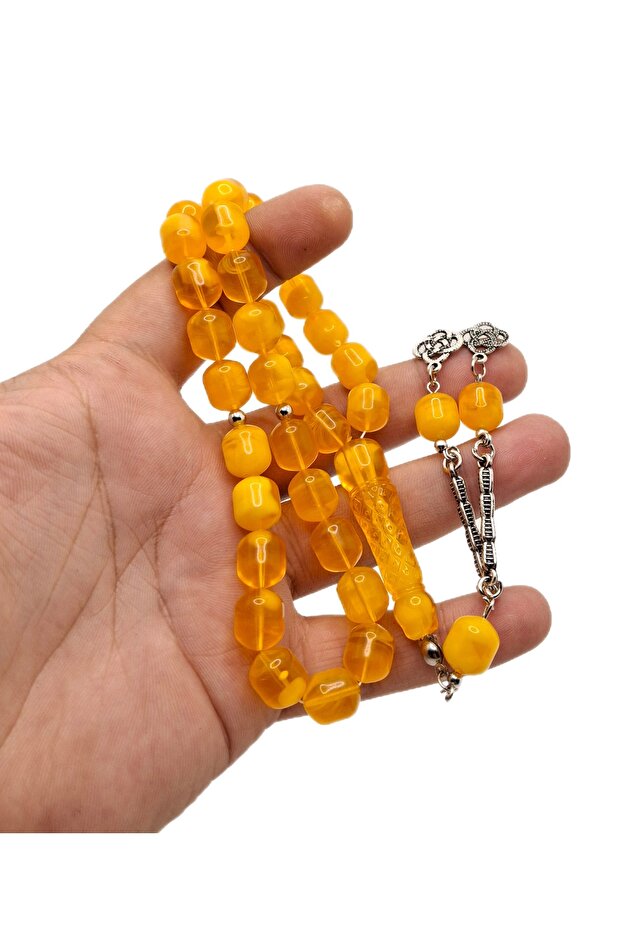 مسبحة صلاة من العنبر المطرز باللون الأصفر