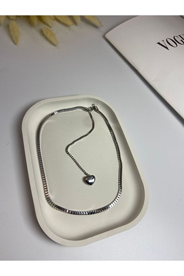 Çelik dekolte kolye gümüş