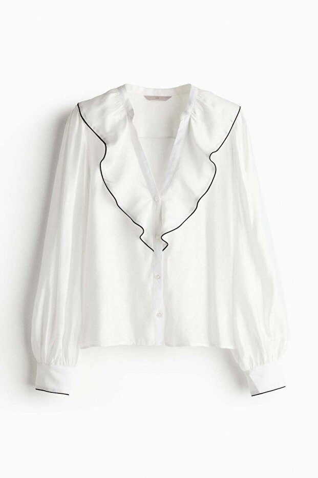 Flounce-trimmed blouse