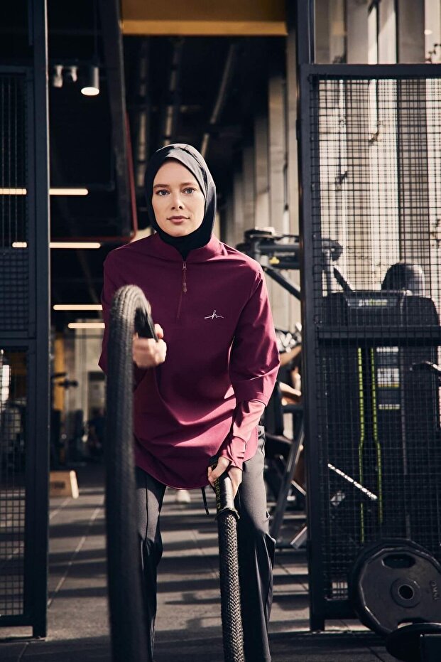 تي شيرت تدريب نسائي طويل الأكمام بسحّاب عند الرقبة باللون الأرجواني من Active Act-9