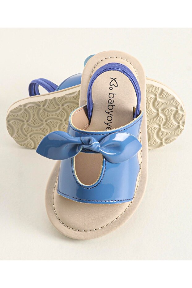 صندل مزين بفيونكة بلون أزرق سادة - 6