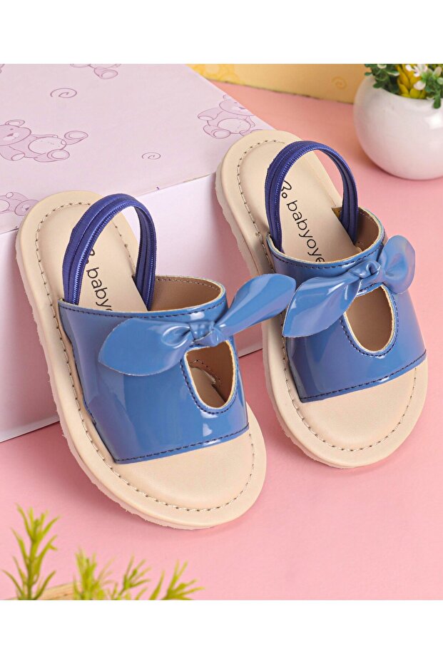 صندل مزين بفيونكة بلون أزرق سادة - 1