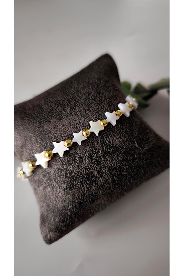 Pearlescent bright star and gold bead necklace