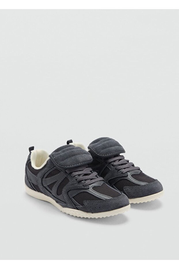 Sneakers mit Ledereinsatz - 1