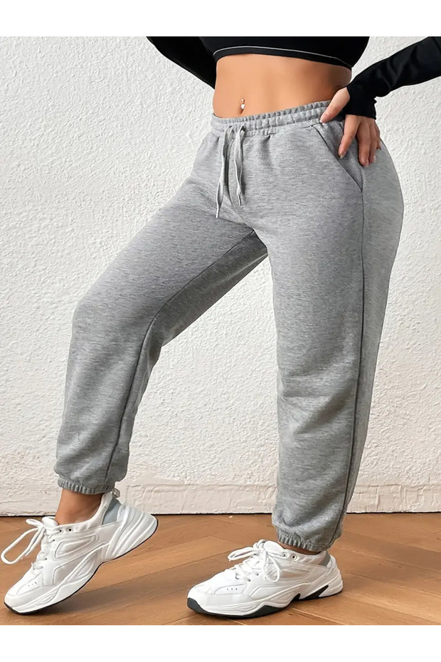 بدلة رياضية JOGGER باللون الرمادي مع قماش قابل للتمدد - ساق مطاطية ومقاومة للعرق 4KHJGJGHKSD